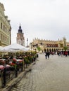 Tourists visiting Town Hall Tower and Rynek Glowny Square Royalty Free Stock Photo